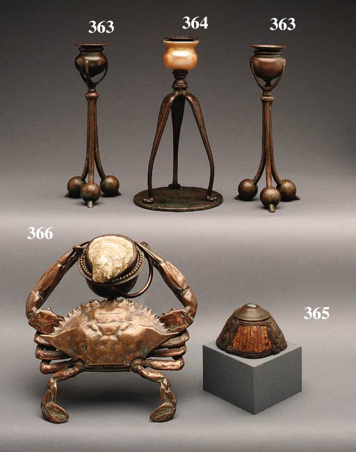 A FAVRILE GLASS AND BRONZE CANDLESTICK