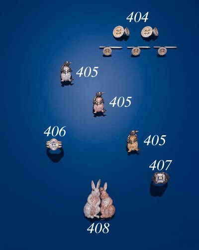 AN AMUSING DIAMOND AND PINK DIAMOND TWIN RABBIT CLIP BROOCH, BY GRAFF