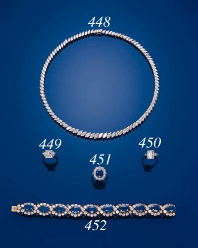 A SINGLE-STONE DIAMOND RING