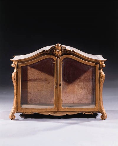 A german giltwood display case