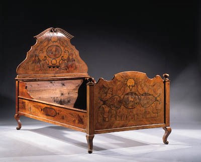 A South German walnut and marquetry bed