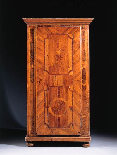 A South German walnut and marquetry cupboard
