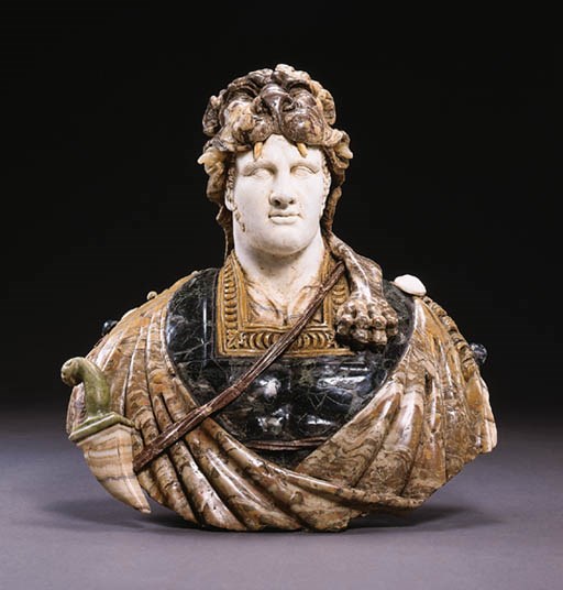 AN ITALIAN SPECIMEN MARBLE BUST OF HERCULES