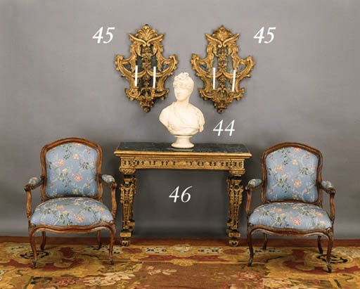 AN ITALIAN BAROQUE PARCEL-GILT AND GREEN-PAINTED SIDE TABLE