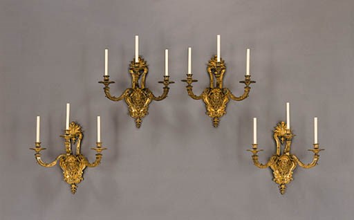 A SET OF FOUR LOUIS XIV STYLE ORMOLU THREE-BRANCH WALL-LIGHTS