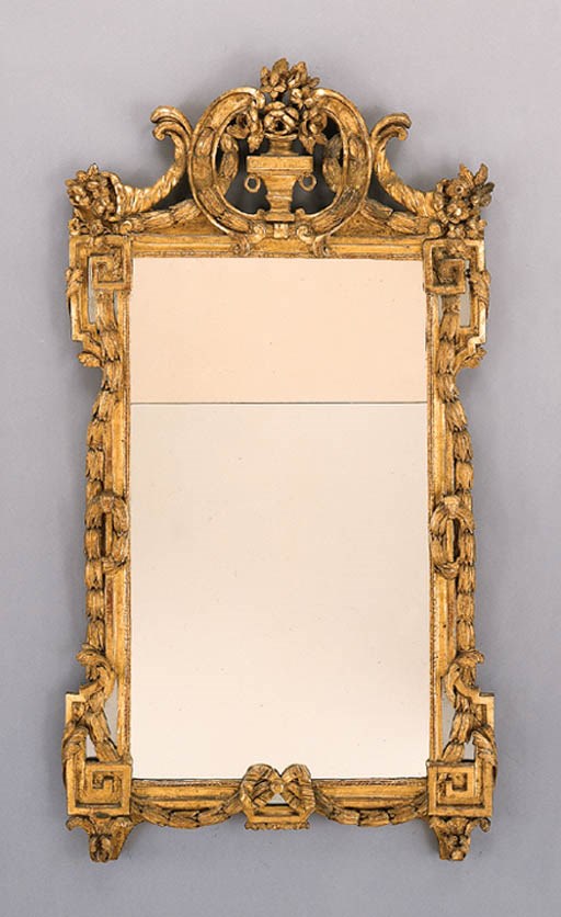 A LOUIS XV/XVI GILTWOOD MIRROR