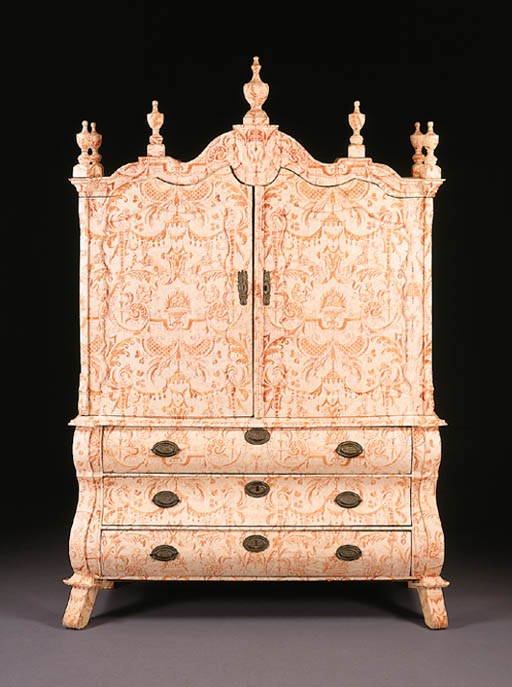 A DUTCH CREAM AND RED FORTUNY FABRIC-COVERED ARMOIRE