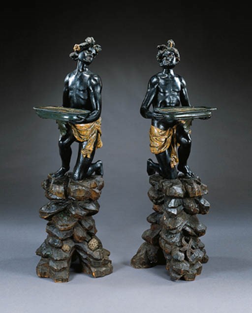 A PAIR OF ITALIAN ROCOCO POLYCHROME-DECORATED BLACKAMOOR FIGURES