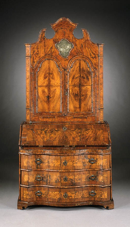 AN ITALIAN BAROQUE WALNUT BUREAU-CABINET