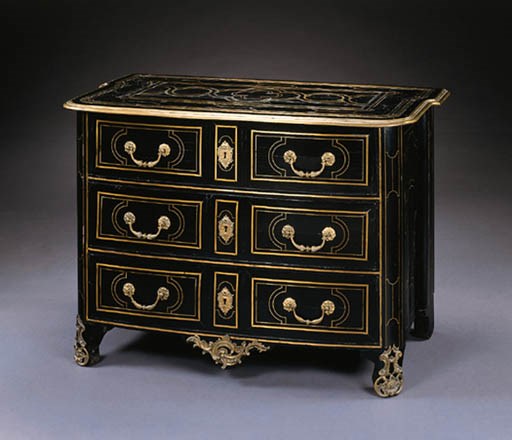 A REGENCE BRASS-INLAID AND BRASS-MOUNTED EBONIZED COMMODE
