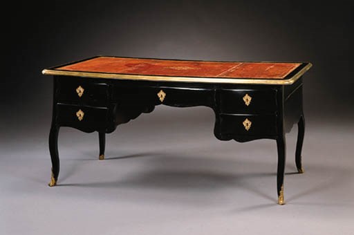 A LOUIS XV ORMOLU-MOUNTED EBONIZED BUREAU PLAT