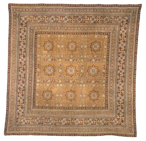 A CONTINENTAL NEEDLEPOINT CARPET