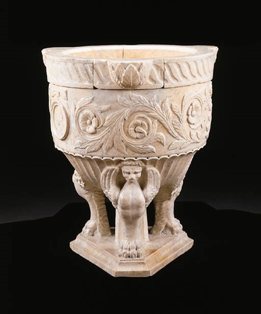 AN ITALIAN RENAISSANCE STYLE MOTTLED WHITE MARBLE FONT