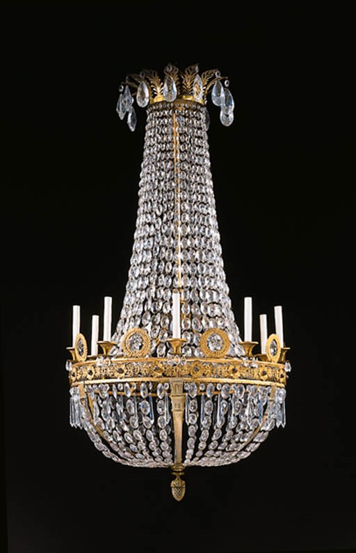 AN EMPIRE STYLE ORMOLU AND CUT-GLASS NINE-LIGHT CHANDELIER