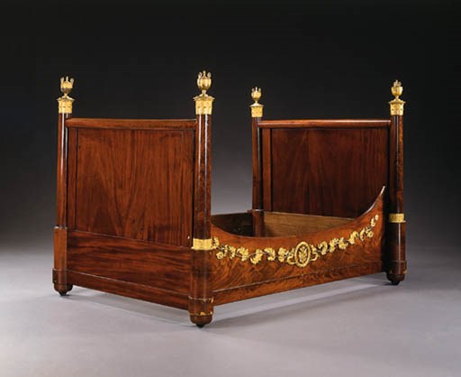 A RESTAURATION ORMOLU-MOUNTED MAHOGANY BED