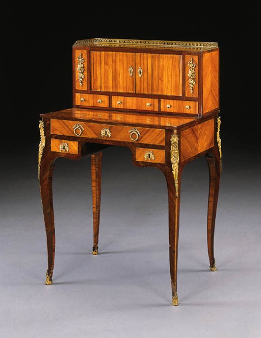 A LOUIS XV/XVI ORMOLU-MOUNTED TULIPWOOD AND AMARANTH BONHEUR DU JOUR