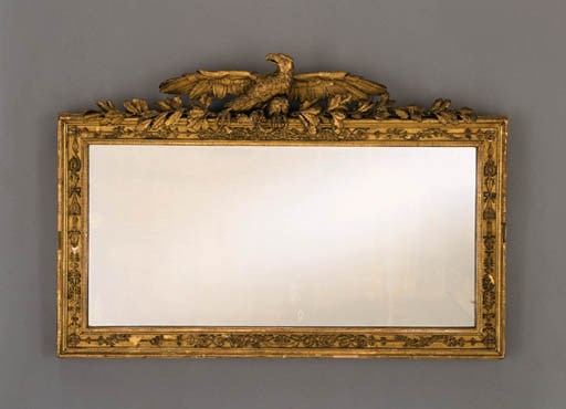 AN EMPIRE GILTWOOD MIRROR