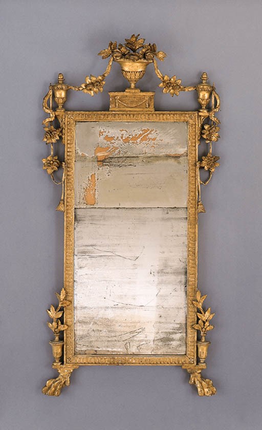 AN ITALIAN NEOCLASSIC GILTWOOD MIRROR