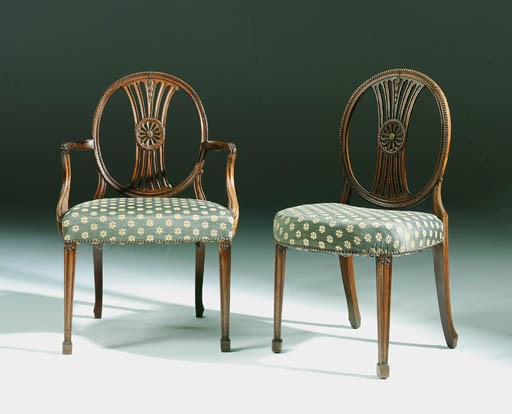 A MATCHED SET OF TWELVE MAHOGANY DINING-CHAIRS