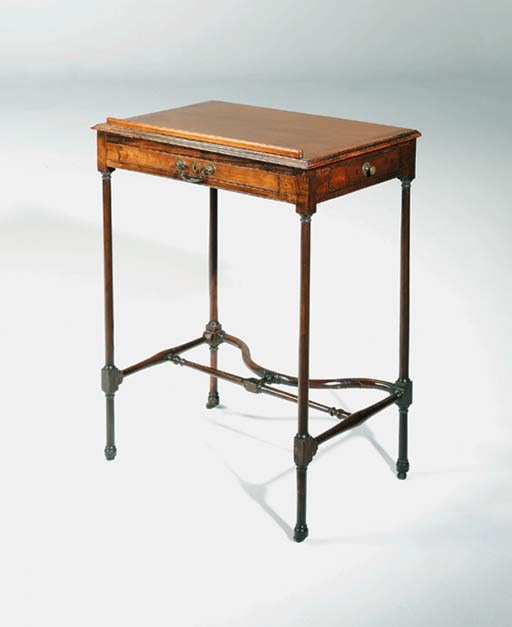 A REGENCY MAHOGANY WRITING-TABLE