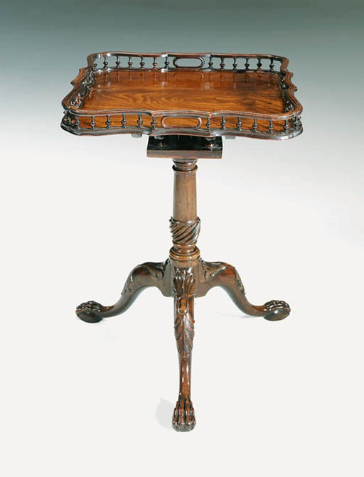 AN EARLY GEORGE III MAHOGANY TRAY-TOP TRIPOD TABLE