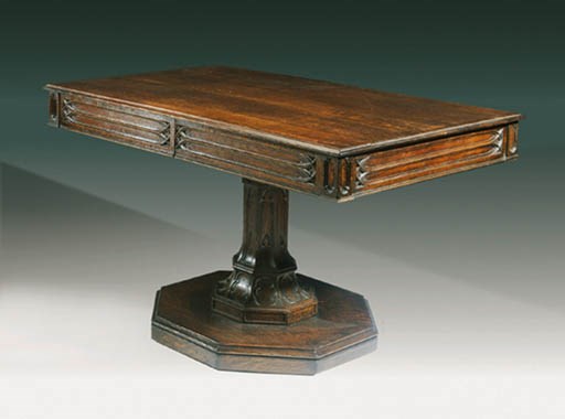 AN EARLY VICTORIAN OAK GOTHIC LIBRARY CENTRE TABLE