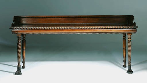 AN IRISH REGENCY MAHOGANY SERVING-TABLE