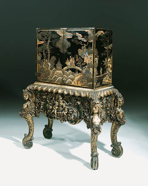 A CHINESE-EXPORT BRASS-MOUNTED COROMANDEL-LACQUER CABINET ON A SILVERED STAND