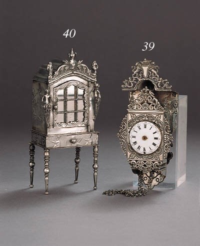 A Dutch silver miniature display cabinet on stand