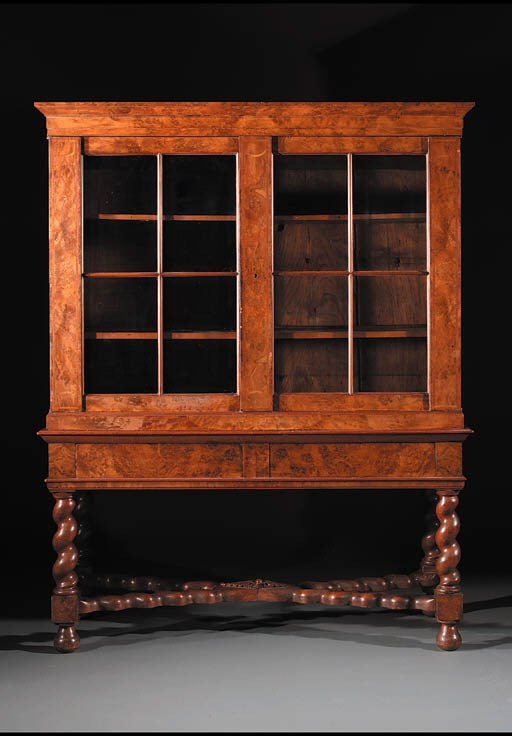 A Dutch William and Mary walnut display cabinet-on-stand