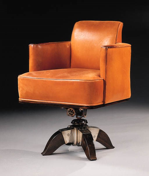 'RODIER', A MACASSAR EBONY AND LEATHER SWIVEL CHAIR, REF. 207 NR