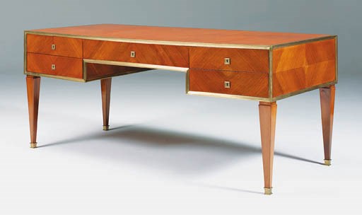 A tulipwood, mahogany and brass mounted desk