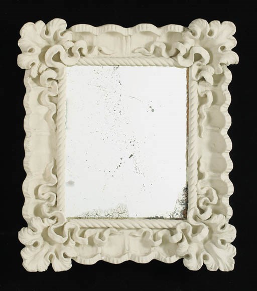 A plaster mirror frame