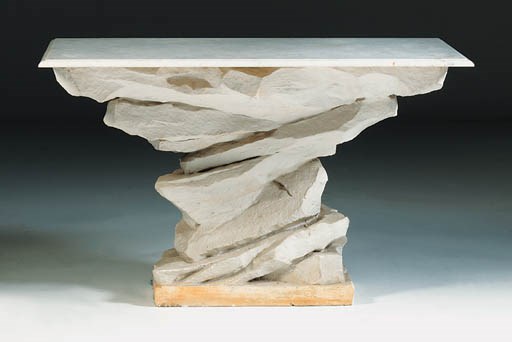 A plaster and marble console table