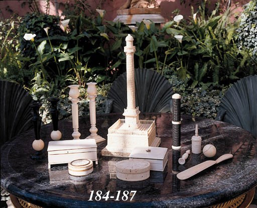 A CARVED IVORY MODEL OF A COLUMN, POSSIBLY TRAJAN'S COLUMN