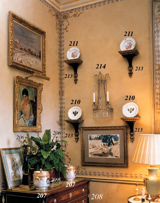 A PAIR OF BRONZE AND ORMOLU THREE-LIGHT CANDELABRA