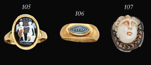 A ROMAN GOLD AND ONYX CAMEO FINGER RING