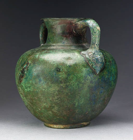 A ROMAN BRONZE TWO-HANDLED JUG