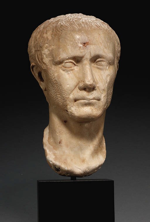 A ROMAN MARBLE PORTRAIT HEAD OF A MAN