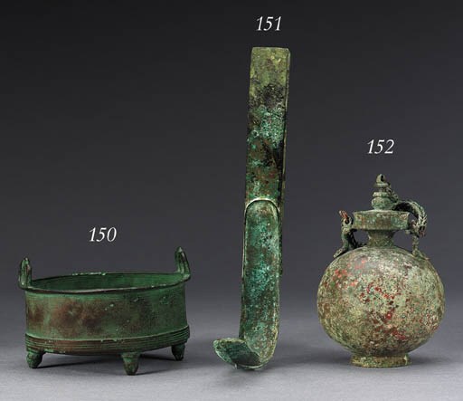 A ROMAN BRONZE STRIGIL