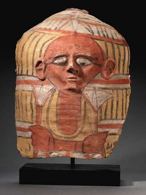 A NEW KINGDOM TERRACOTTA ANTHROPOID SARCOPHAGUS LID