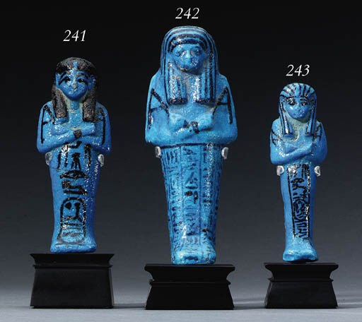 A THIRD INTERMEDIATE PERIOD BLUE FAIENCE ROYAL SHABTI