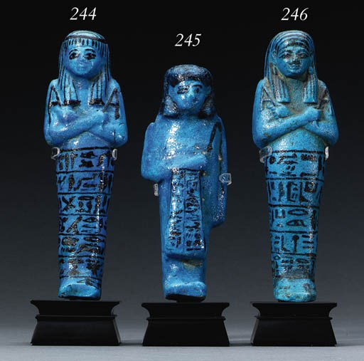 A THIRD INTERMEDIATE PERIOD BLUE FAIENCE ROYAL SHABTI FOR NESI-KHONSU