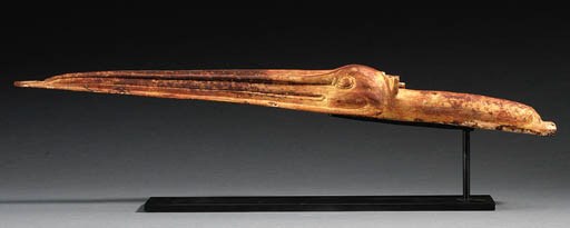 A GILT WOOD IBIS HEAD