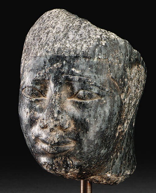 A KUSHITE CEPHREN DIORITE HEAD OF AN OFFICIAL
