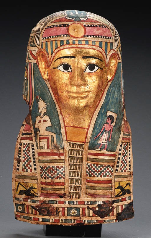 A GILT CARTONNAGE MUMMY MASK