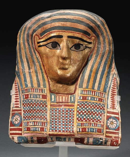 A GILT CARTONNAGE MUMMY MASK