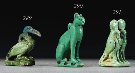 A GREEN FAIENCE DOUBLE BA BIRD AMULET