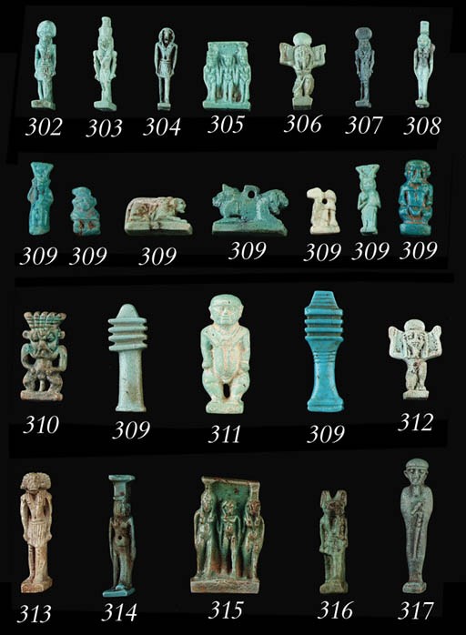 A GREEN FAIENCE AMULET OF ANUBIS