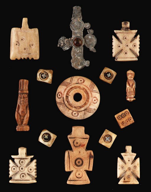 FOURTEEN IVORY AND BONE PIECES